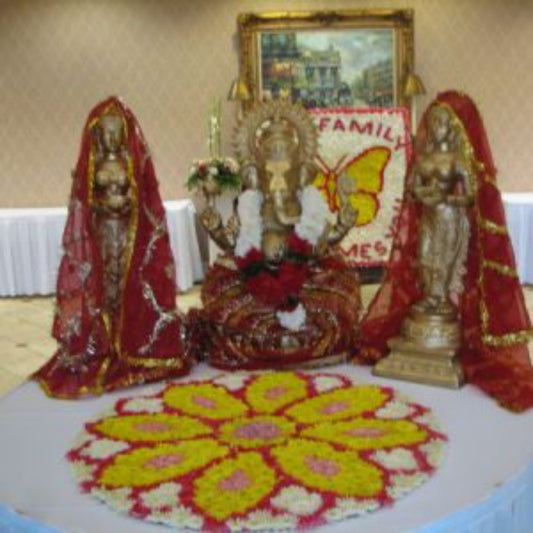 Ganesha With Flower Rangoli